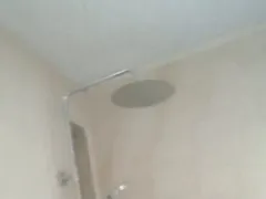 Ducha con columna de lluvia en un baño reformado por Galipo Reformas